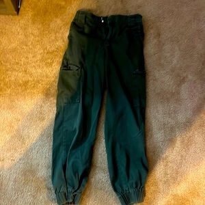 Green cargo pants. Super cute and looks good paired with black tops!